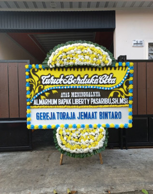 Papan Bunga Duka di Bantai Napu